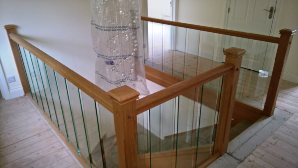 Custom Made Staircases Yarmouth - a wood and glass staircase installation by The Staircase Factory