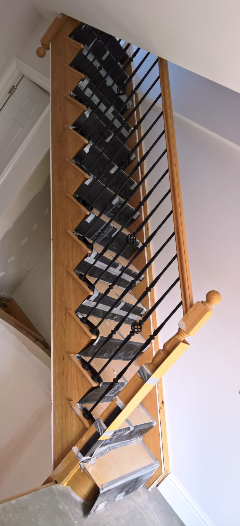 straight flight with metal balusters installed by The Staircase Factory, Isle of Wight